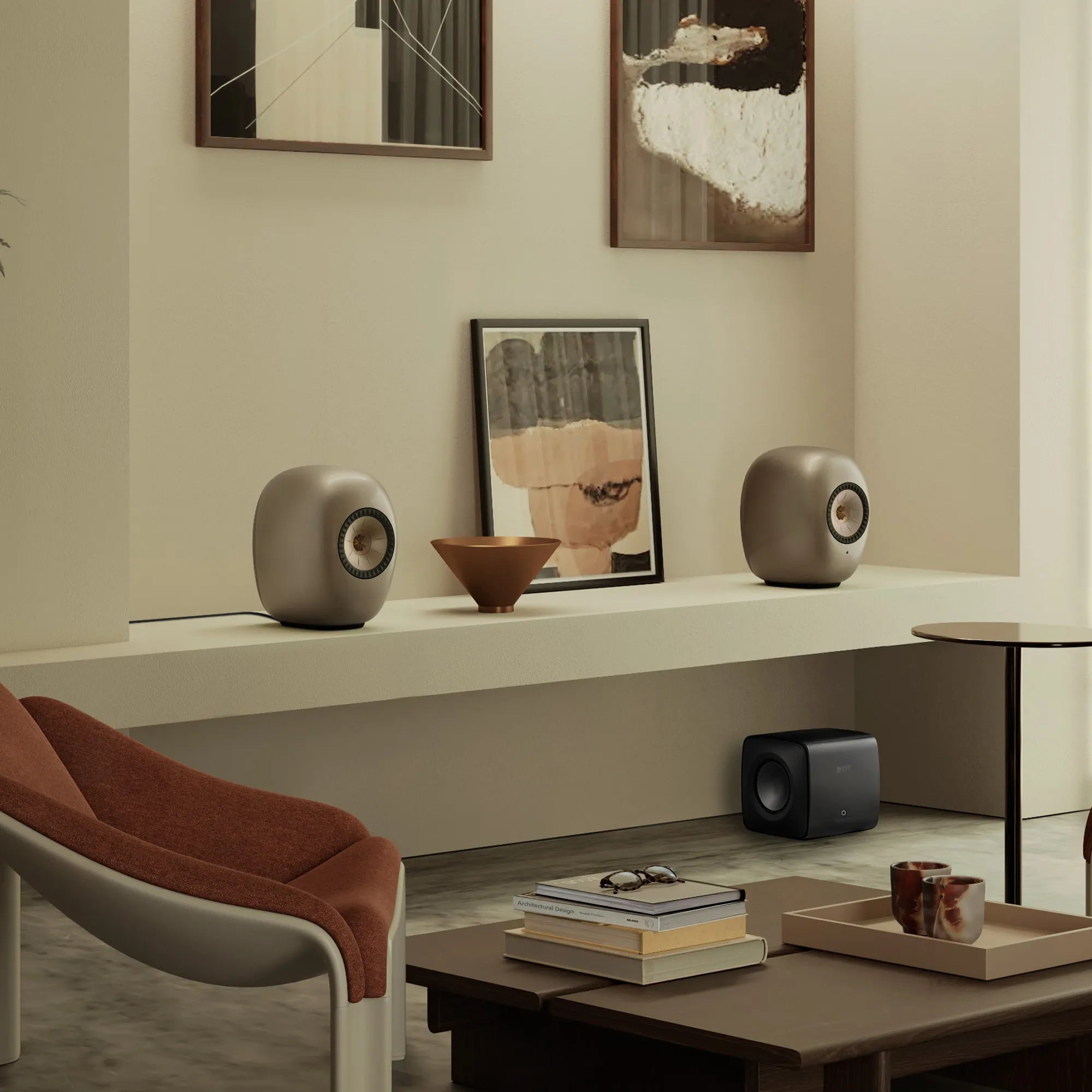 KEF LS Luxe in Dusk Titanium on a living room shelf