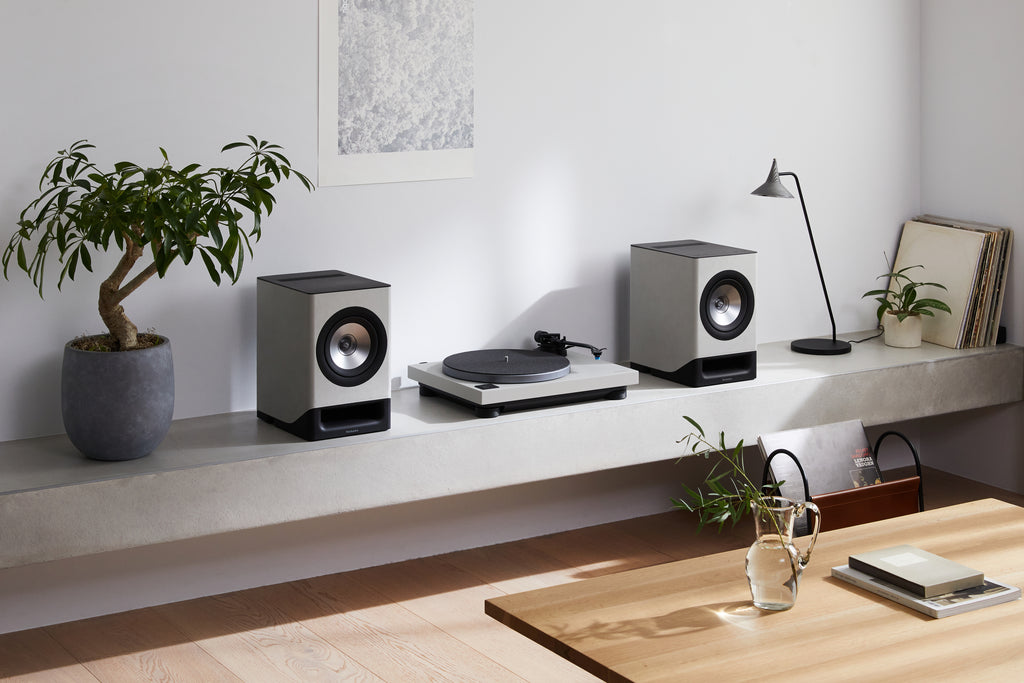 Technics SL-40CBT turntable with black finish, featuring tonearm and platter, designed for high-quality vinyl playback.