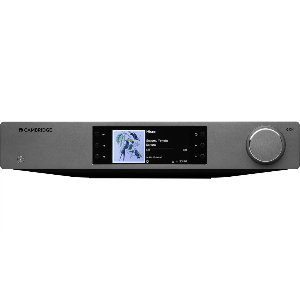 Cambridge Audio CXN100 SE music streamer with sleek black design and front display screen, connected to audio equipment.