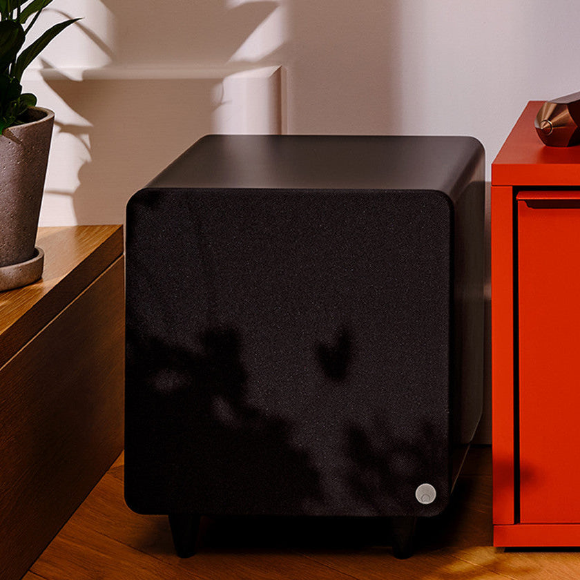 Cambridge Audio MSX Sub 300 subwoofer with sleek black enclosure and control panel, designed for deep bass sound.