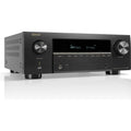 White Denon AVC-X3900H stereo amplifier showing front panel with control knobs and display screen.