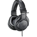 Audio Technica ATH-M20x studio headphones with over-ear design and adjustable headband, black color, for professional audio monitoring.