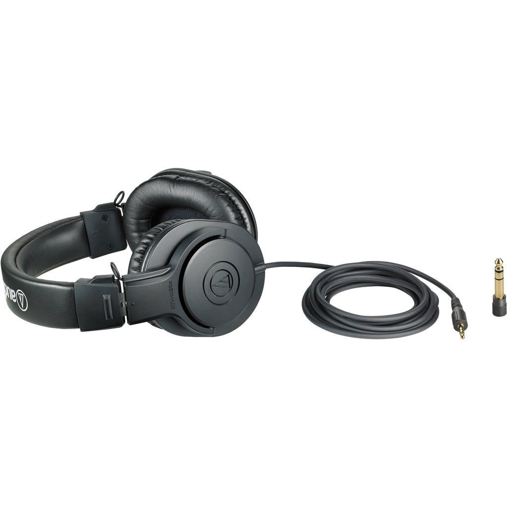 Audio Technica ATH-M20x studio headphones with over-ear design and adjustable headband, shown in a side view.