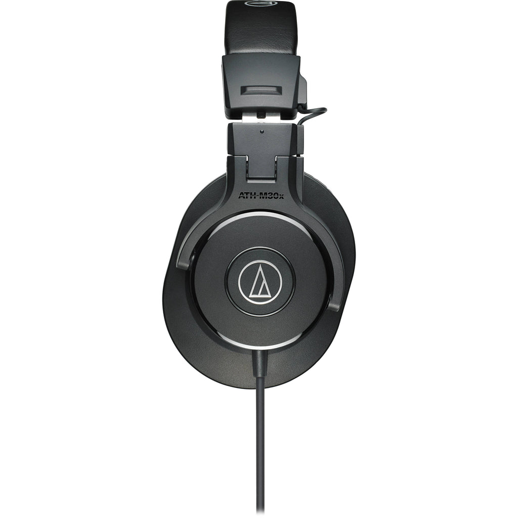 Audio Technica ATH-M30x studio headphones with over-ear design, black color, and adjustable headband for professional audio monitoring.
