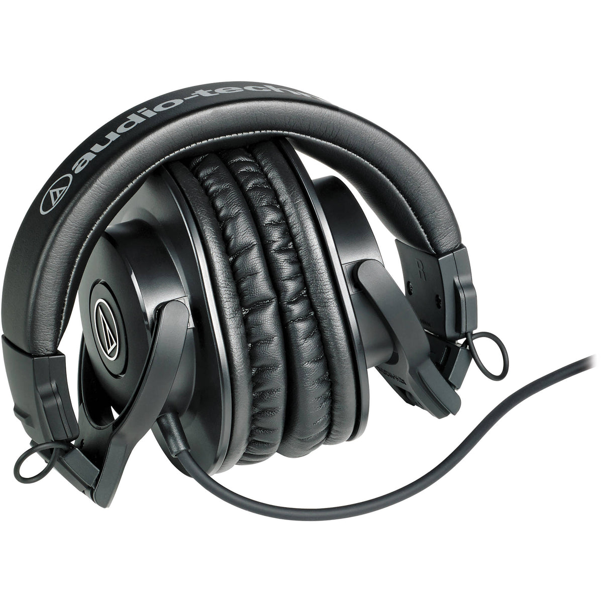 Audio Technica ATH-M30x studio headphones with over-ear design and padded ear cups, ideal for professional audio monitoring.