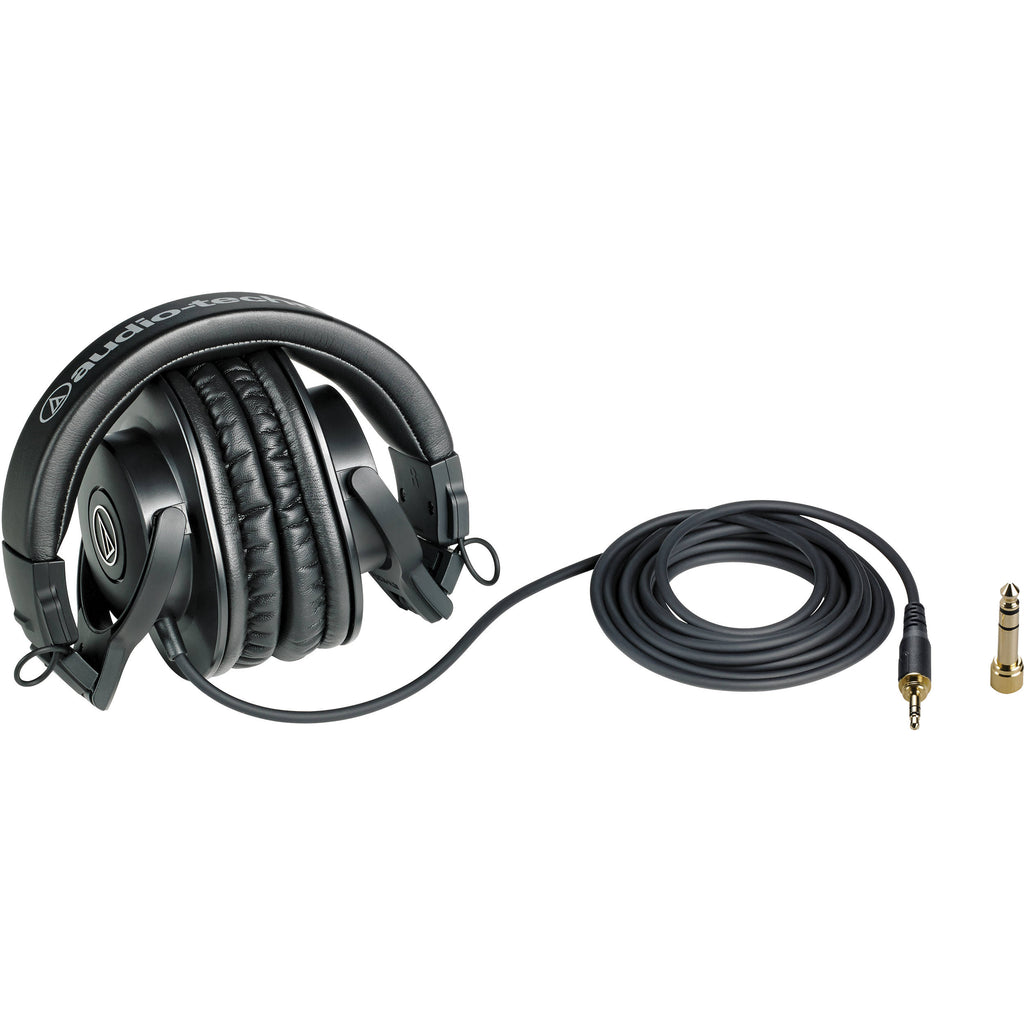 Audio Technica ATH-M30x studio headphones with over-ear design and adjustable headband, shown in a close-up view.