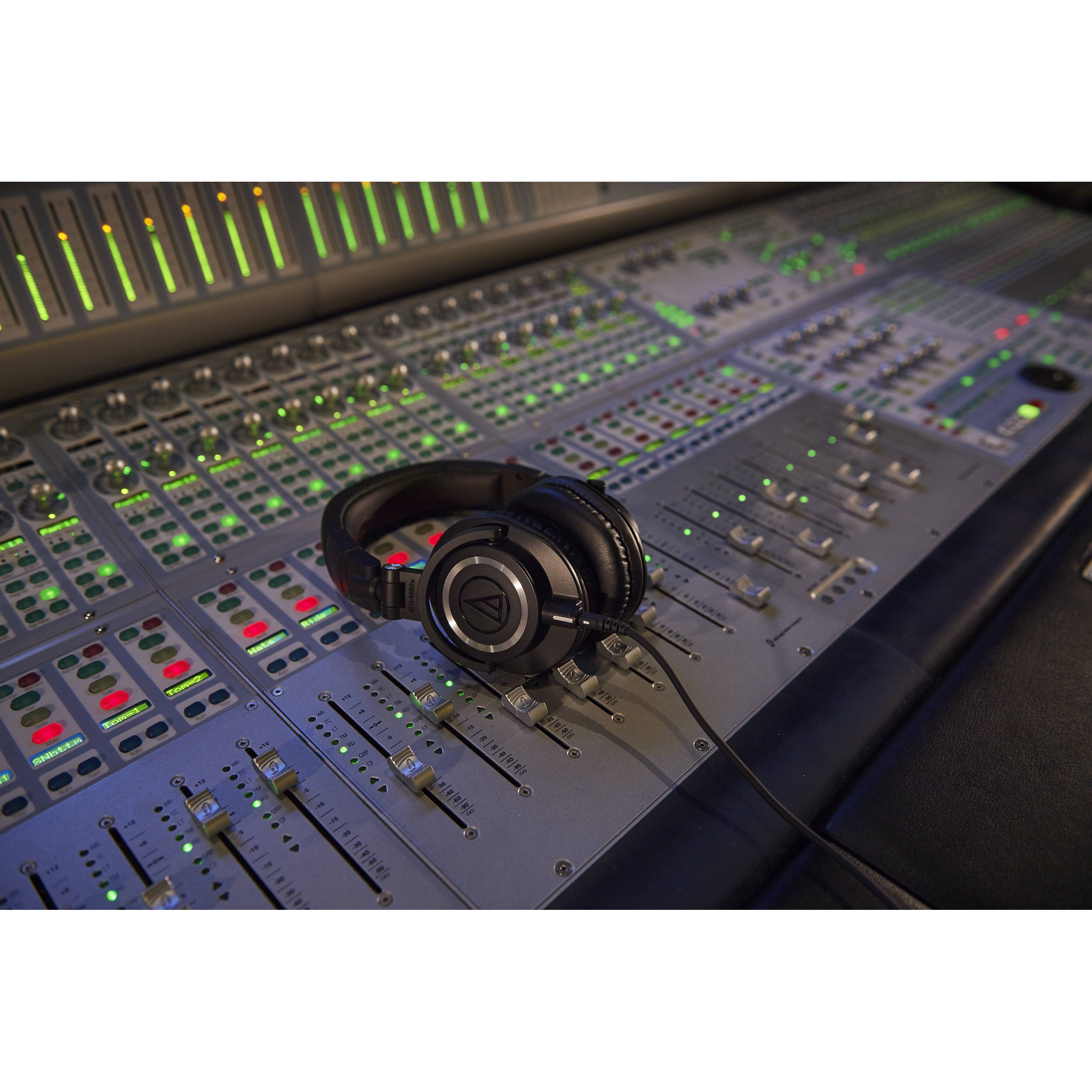 Audio Technica ATH-M50x studio headphones with large ear cups and adjustable headband, designed for professional audio monitoring.