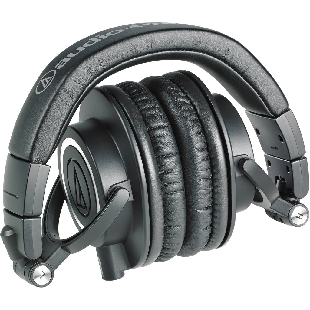 Audio Technica ATH-M50x studio headphones with over-ear design and cushioned ear cups, shown in black on a plain background.