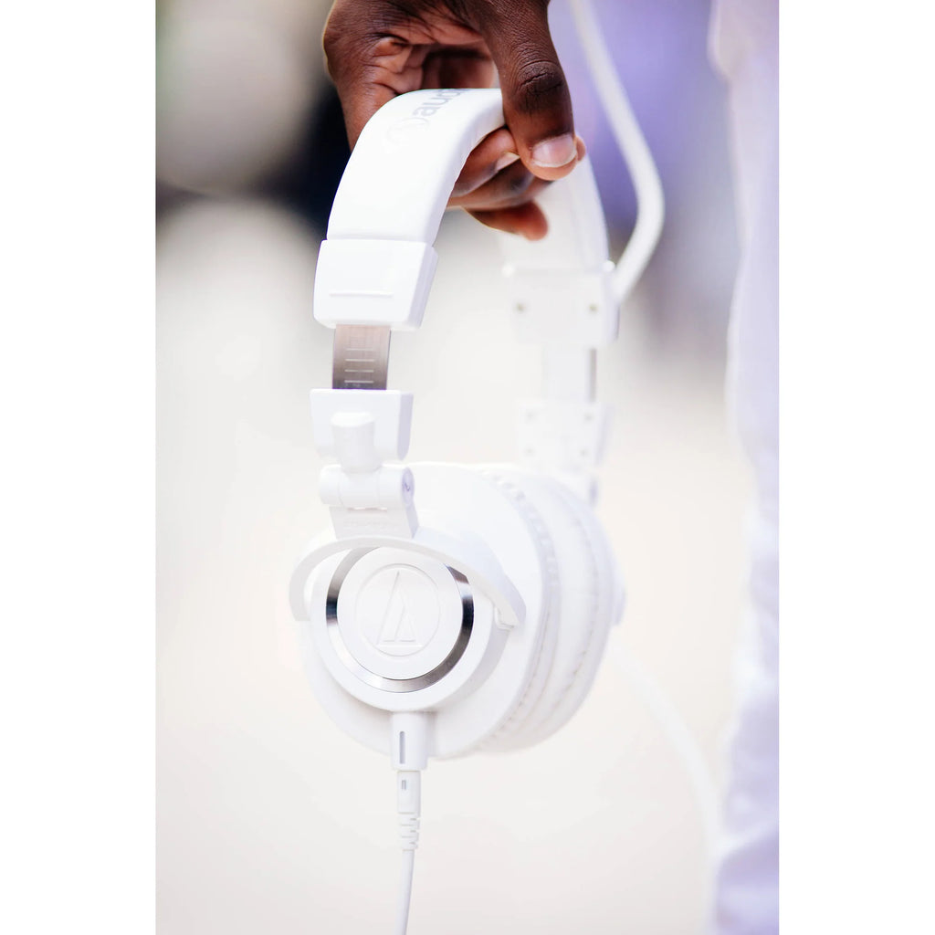 Audio Technica ATH-M50x studio headphones with black ear cups and adjustable headband, designed for professional audio monitoring.