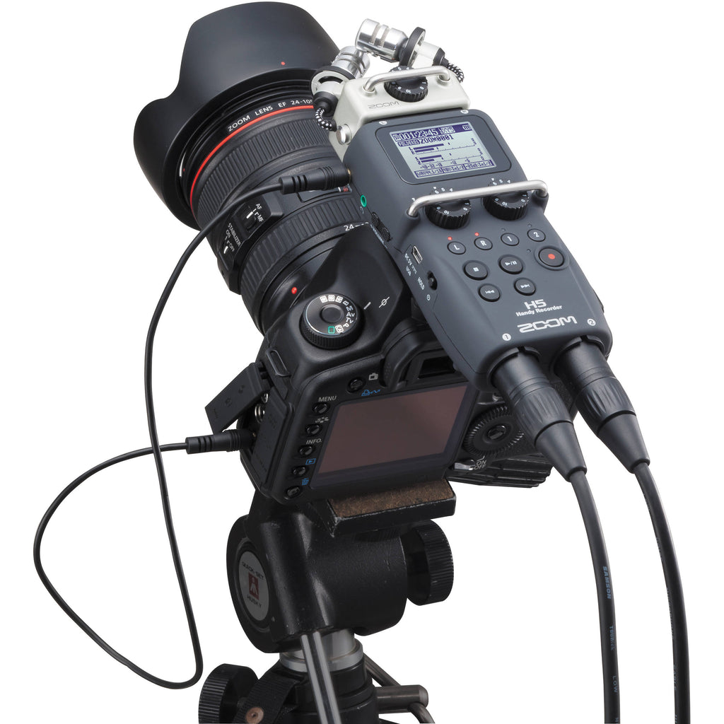 Zoom H5 digital recorder with multiple input ports and compact design, ideal for professional audio recording.