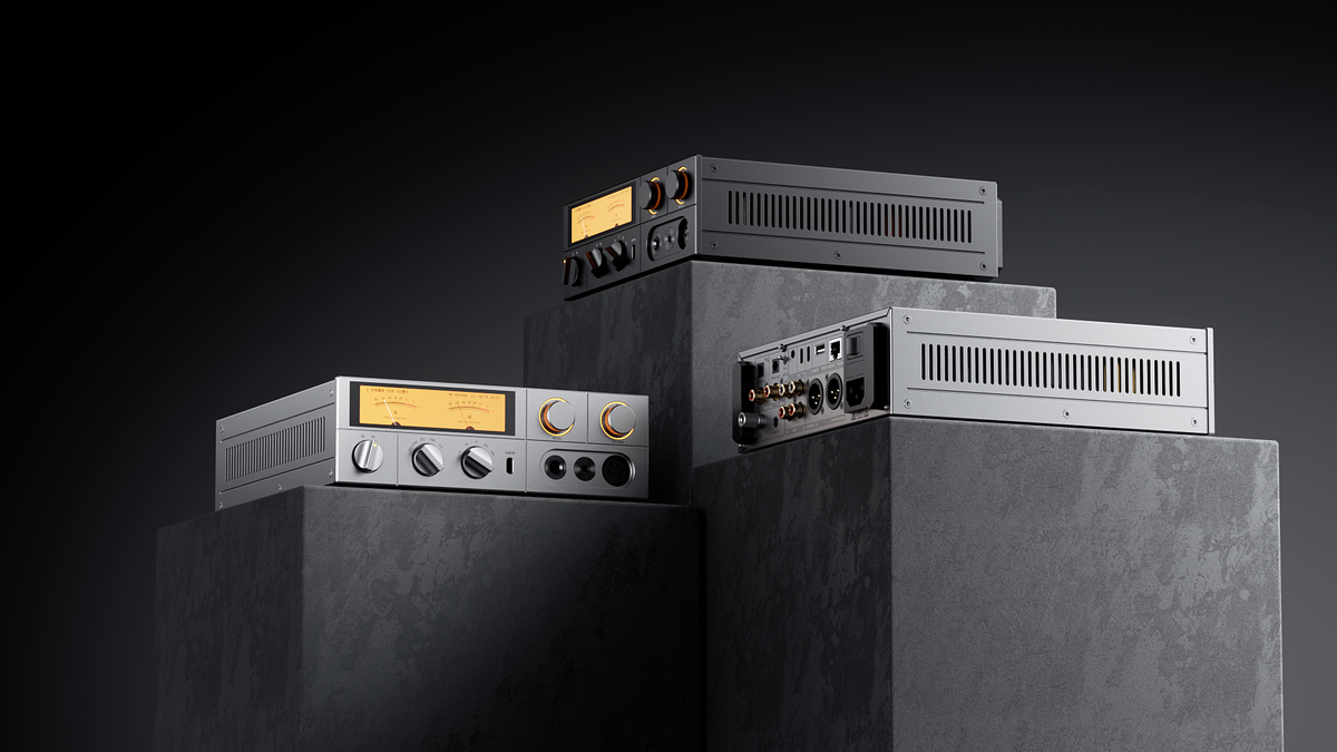 FiiO K17 headphone amplifier and DAC with sleek black design, multiple input ports, and adjustable volume controls.