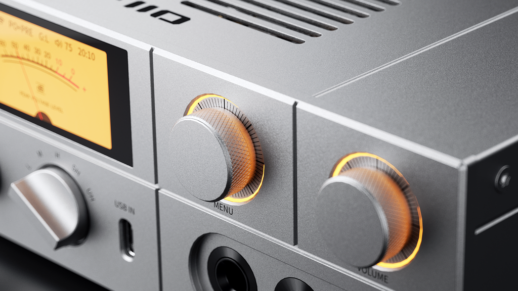 FiiO K17 headphone amplifier and DAC with sleek black design, multiple input ports, and digital controls for high-quality audio output.