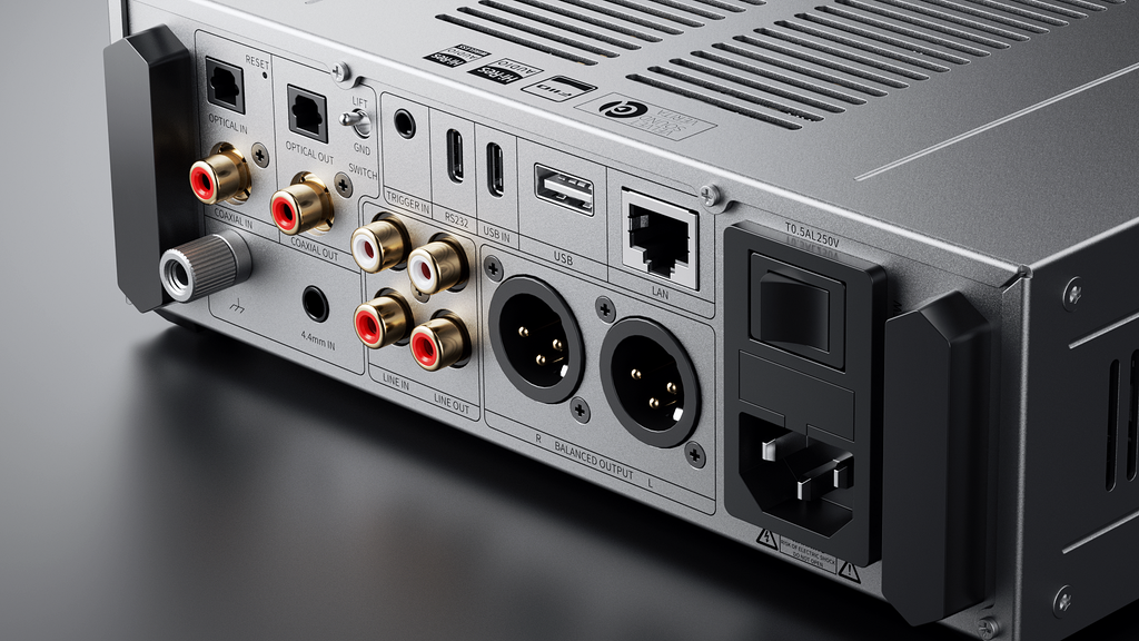 FiiO K17 headphone amplifier and DAC with sleek design, visible controls, and input/output ports on a modern electronic device.