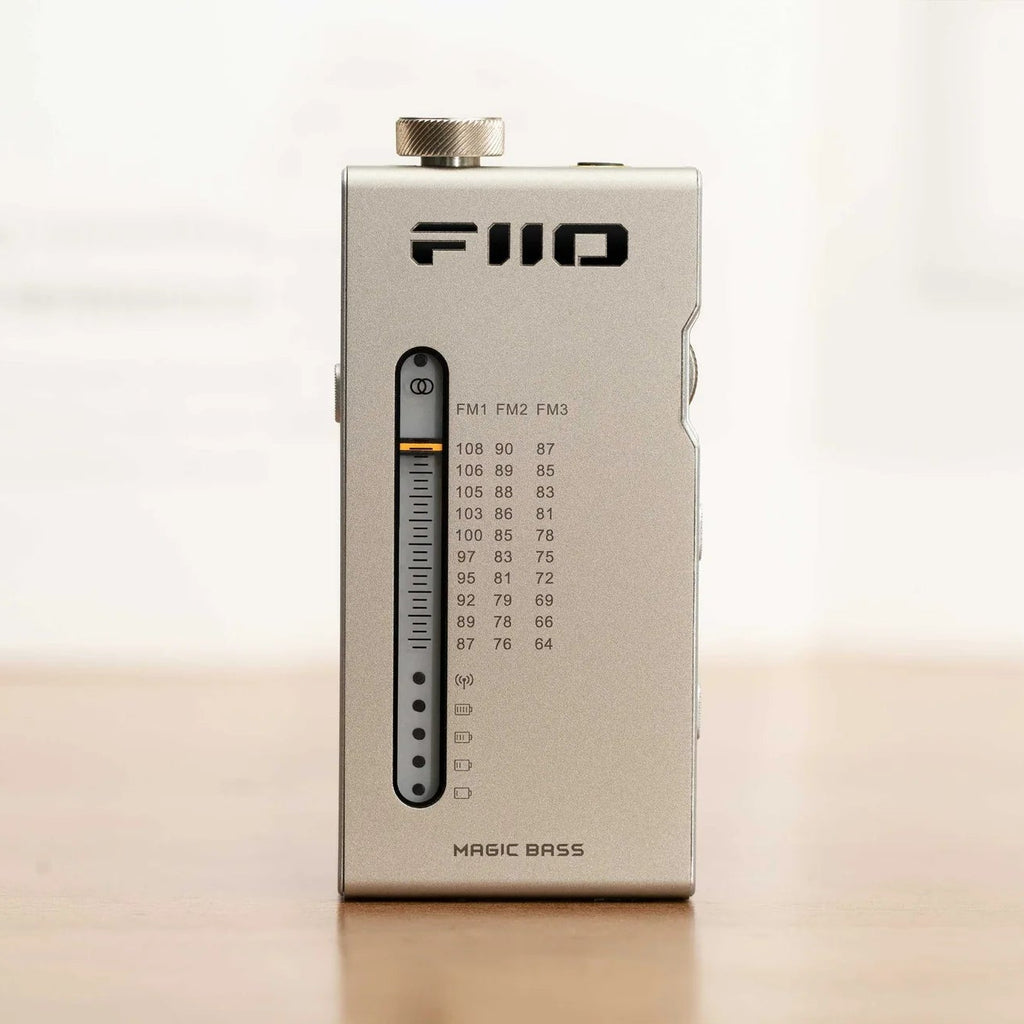 FiiO RR11 radio with digital display, tuning dial, and control buttons on a sleek black finish.