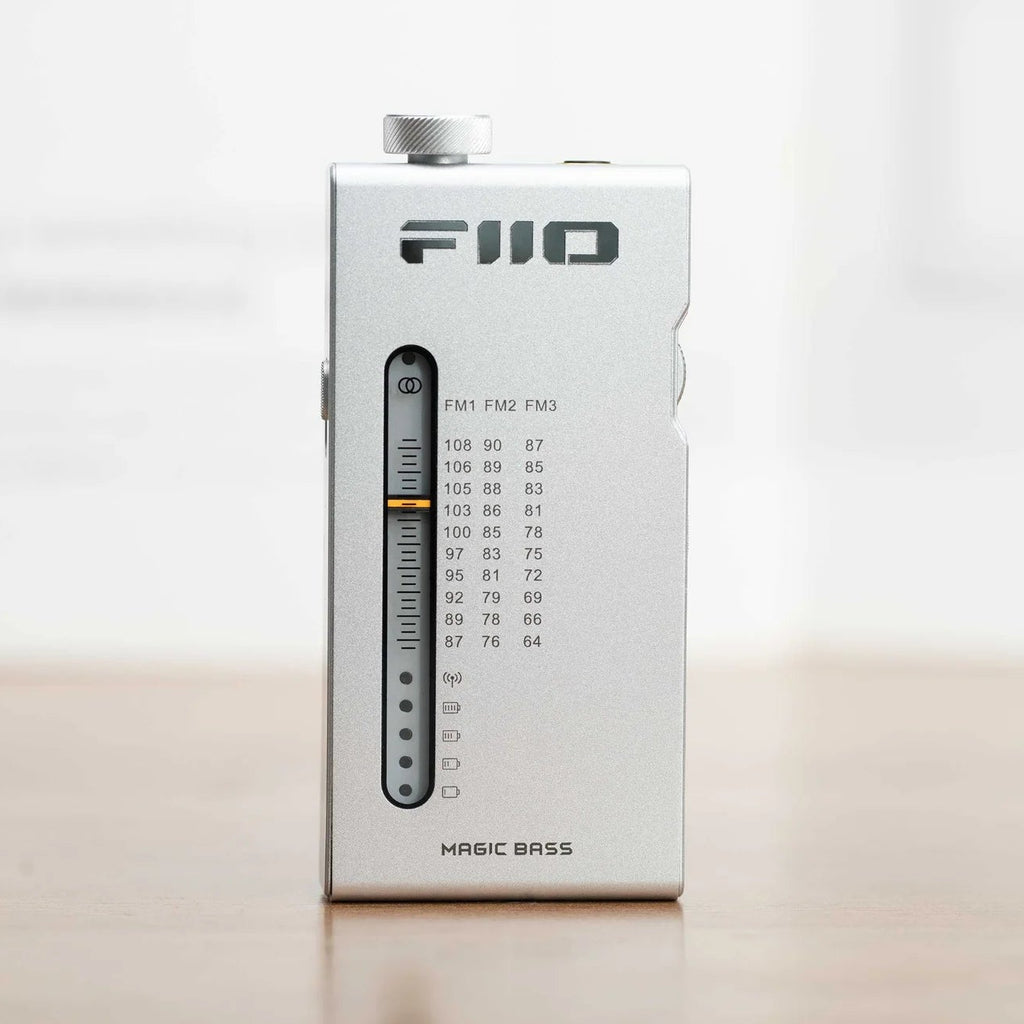 FiiO RR11 radio with digital display and control buttons, black color, compact design, and tuning dial visible in the image.