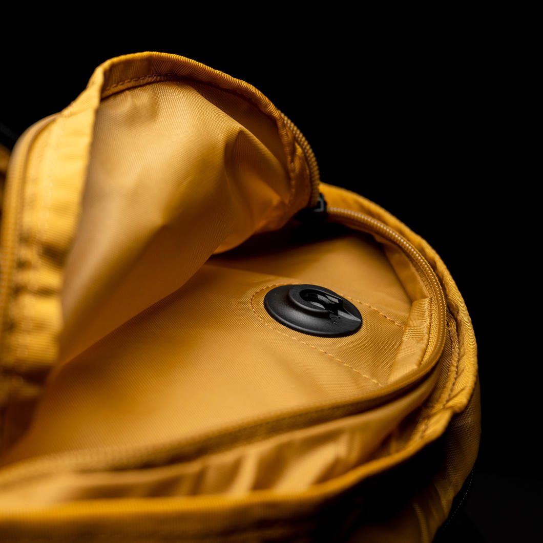 Boundary Supply Rennen Daypack X-Pac shown in a video equipment bag with multiple compartments and durable X-Pac material.