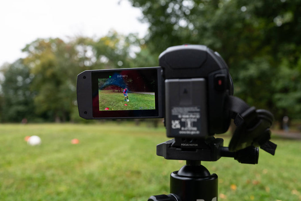Panasonic HC-VX3 camcorder with 1060W lens, compact design, and professional features for high-quality video recording.