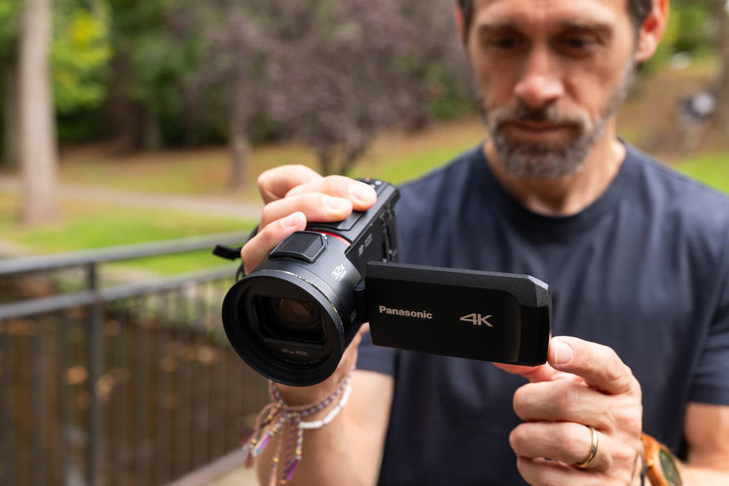 Panasonic HC-VX3 camcorder with 1060W lens and compact design, ideal for high-quality video recording and filming.