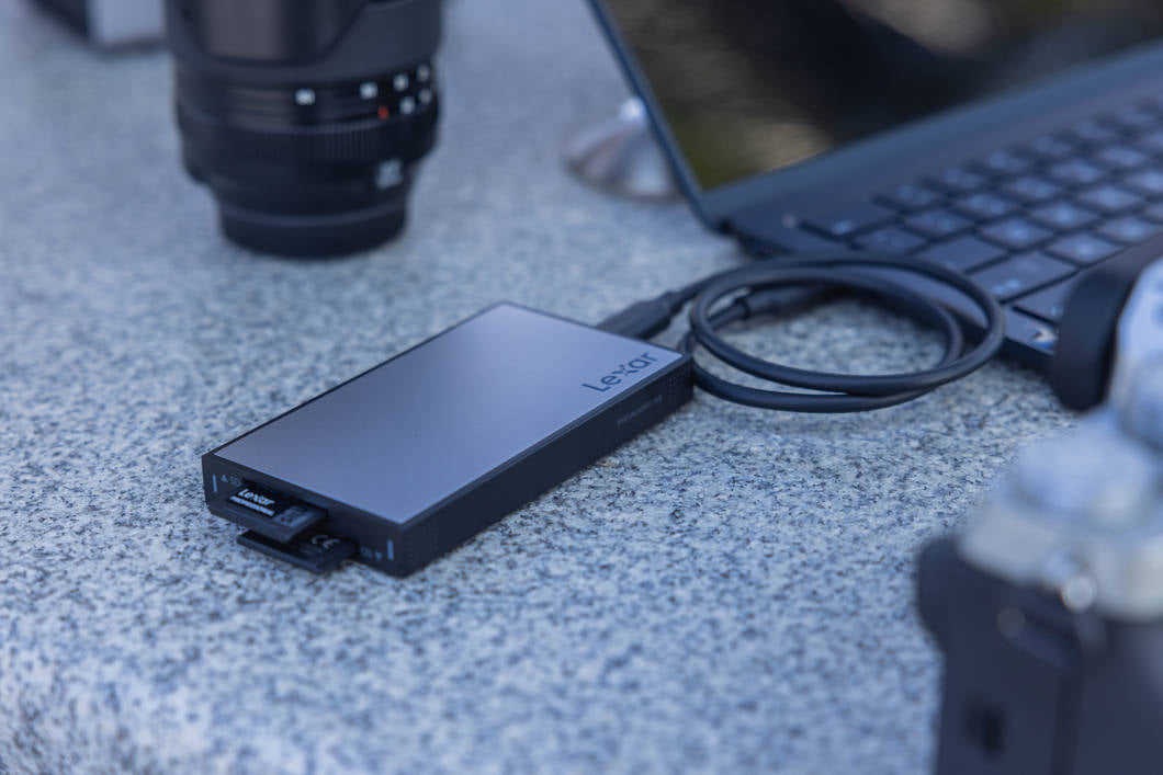Lexar Workflow Dual-Slot SD UHS-II Card Reader with two SD card slots and a sleek black design.