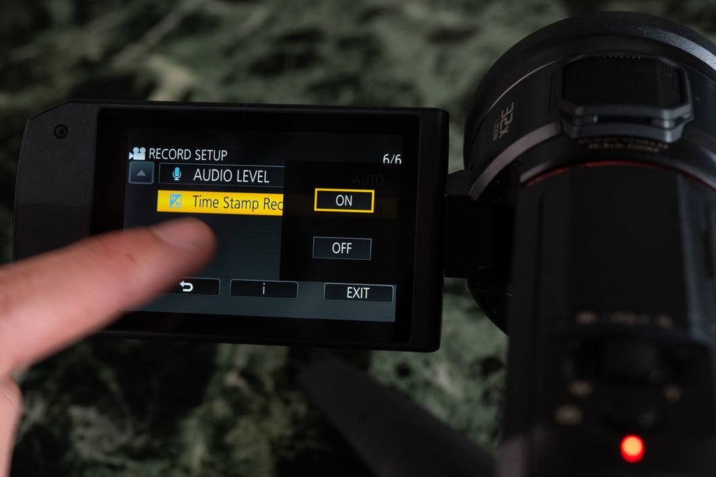 Panasonic HC-VX3 camcorder with 1060W lens, compact design, and professional features for high-quality video recording.