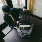 Wandrd Prvke Zip video equipment bag with multiple compartments and padded interior for safe camera gear storage.