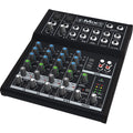Mackie Mix8 analog mixer with multiple input channels and control knobs, compact audio mixing device.