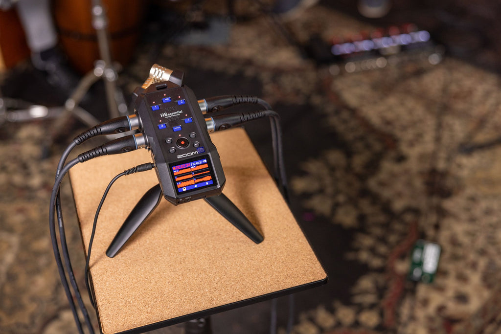 Zoom H6 Essential digital recorder with multiple input ports, compact design, and professional audio recording features.