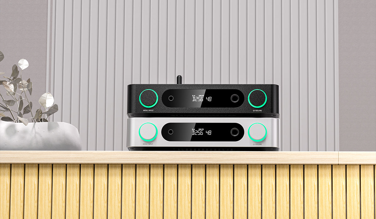 FiiO K13 R2R headphone amplifier and DAC with sleek design and multiple input options for high-quality audio.