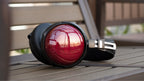 FiiO FT13 wired headphones with black ear cups and silver accents, featuring in-ear design and inline remote control.