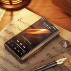 FiiO M27 portable music player with digital display, black body, and control buttons on the front, designed for high-quality audio.