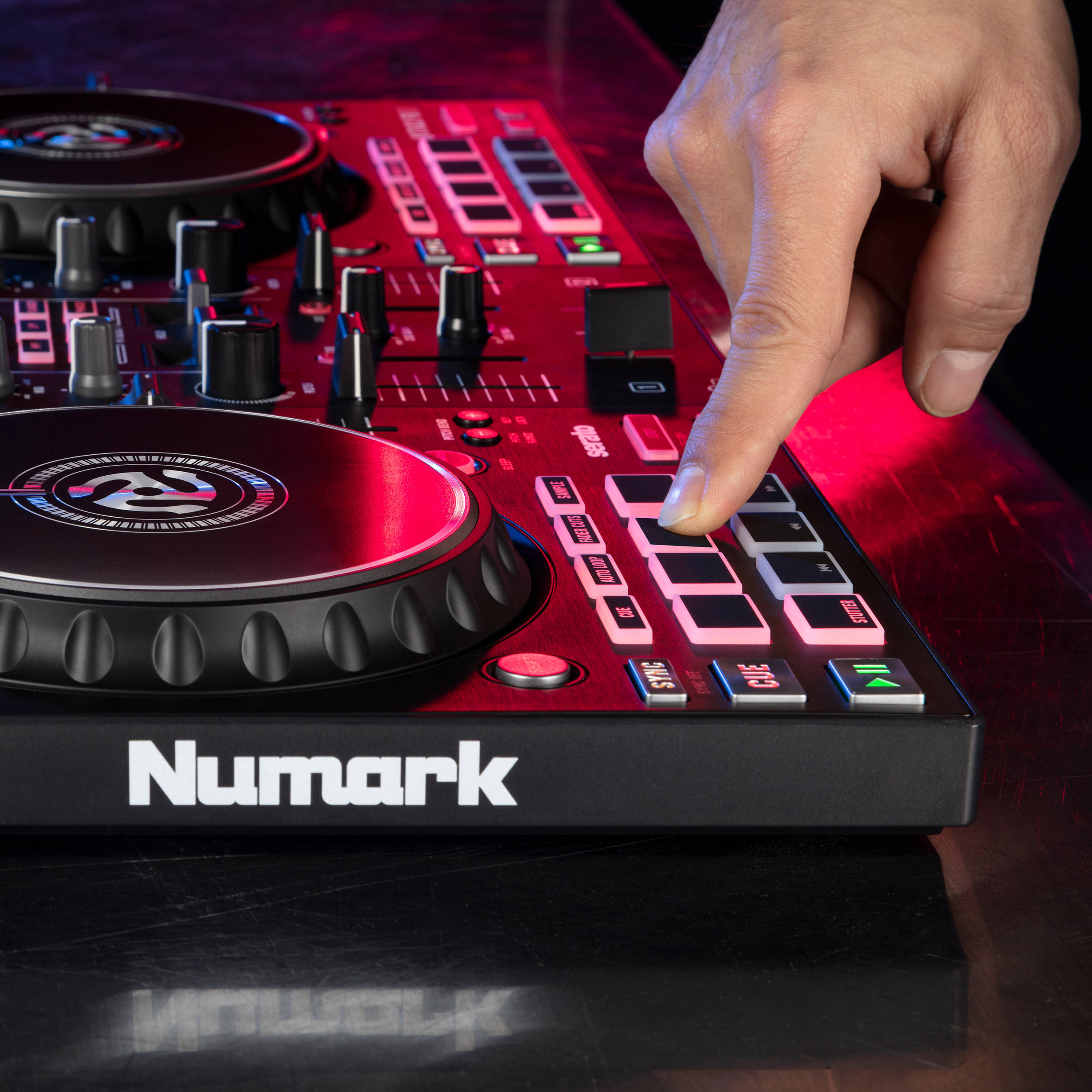 Numark Mixtrack Pro FX DJ controller with jog wheels, buttons, and sliders for professional music mixing and DJ performances.