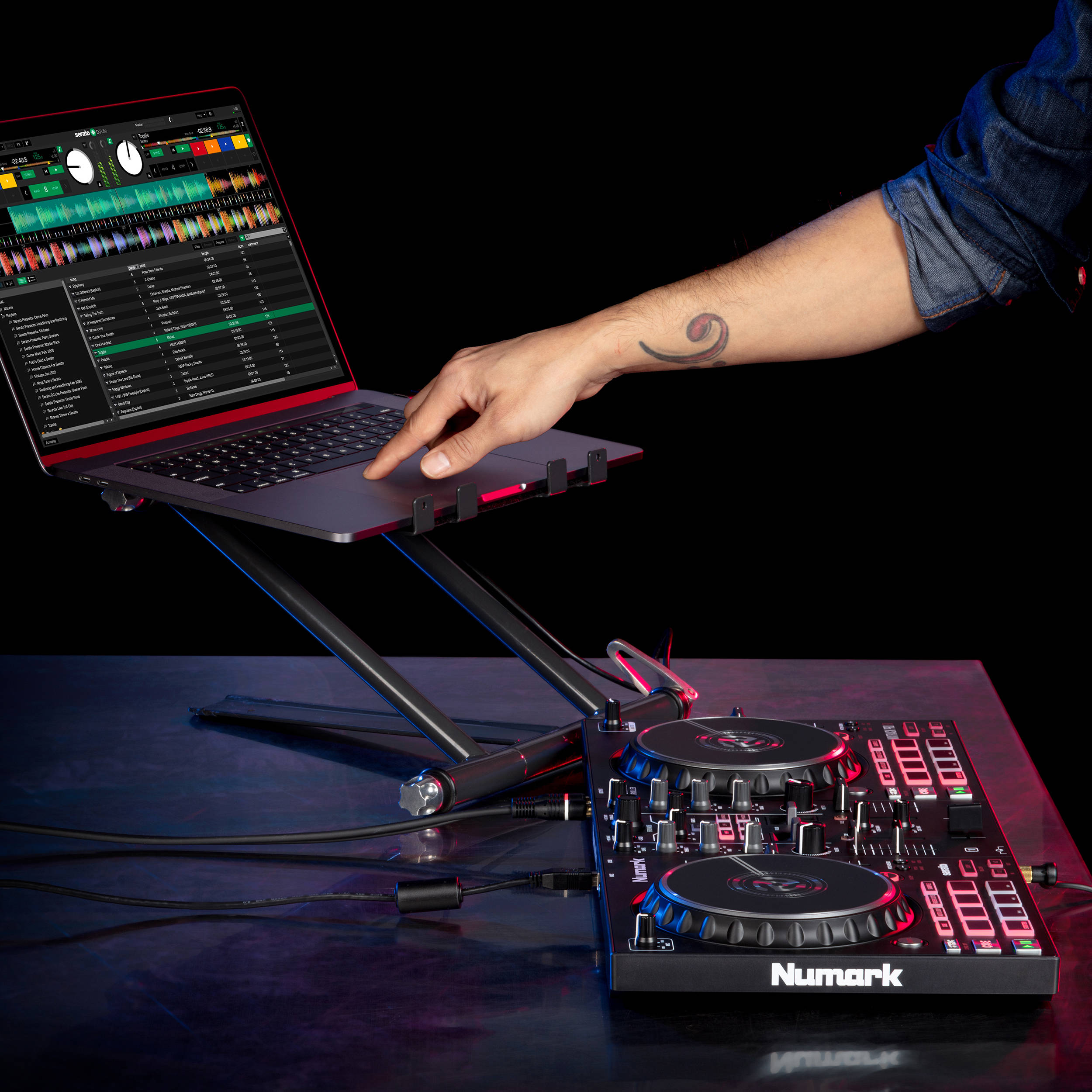 Numark Mixtrack Pro FX DJ controller with jog wheels, faders, and control knobs for digital mixing and DJ performances.
