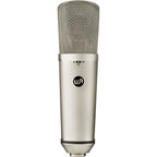 Warm Audio WA-87 R2 condenser microphone on a stand, showing its vintage-inspired design and large diaphragm for studio recording.