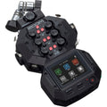 Zoom H8 digital recorder with multiple input ports and colorful interface, shown on a white background.
