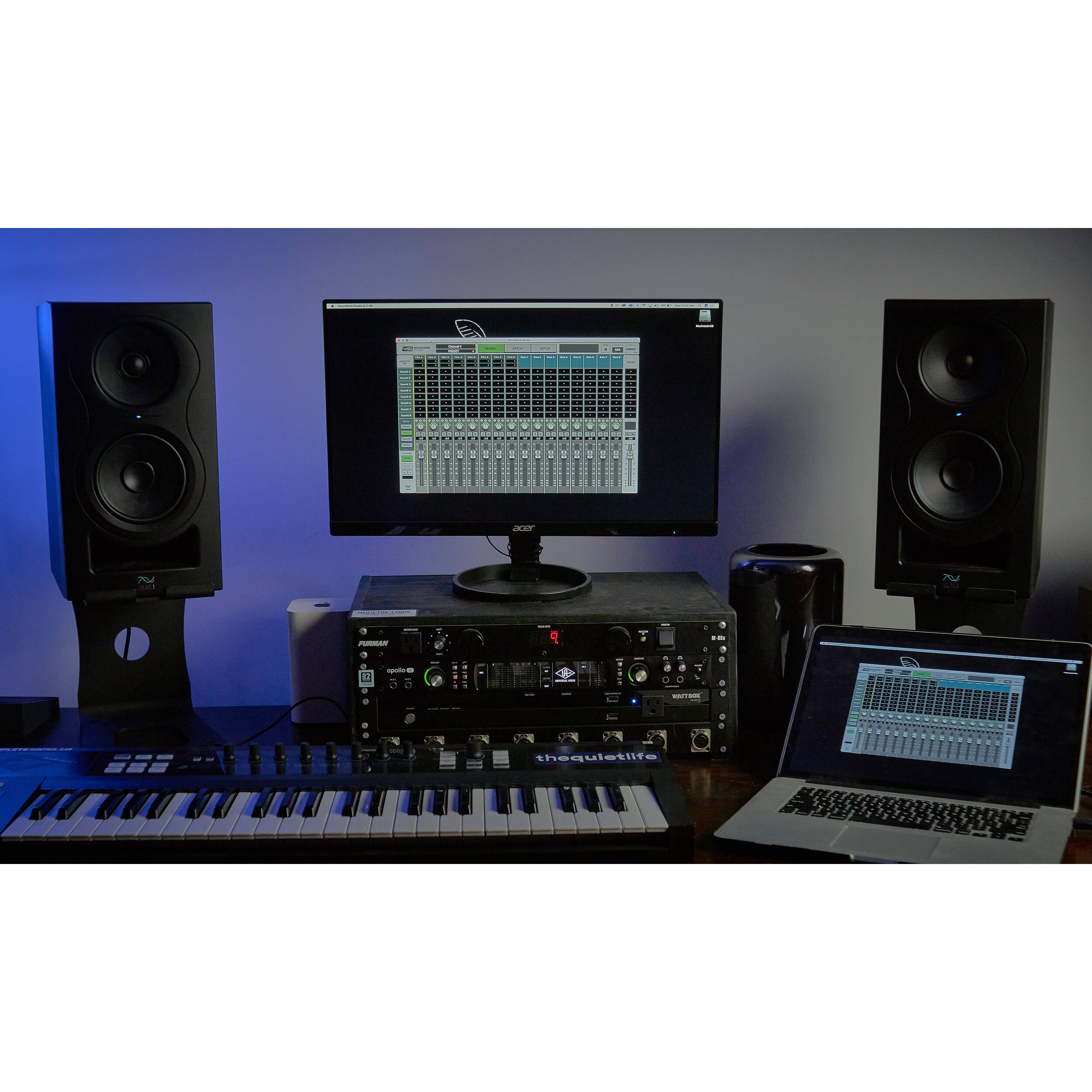 Kali Audio IN-5 active nearfield monitors shown from front view, featuring black speaker cabinets with control knobs and speaker drivers