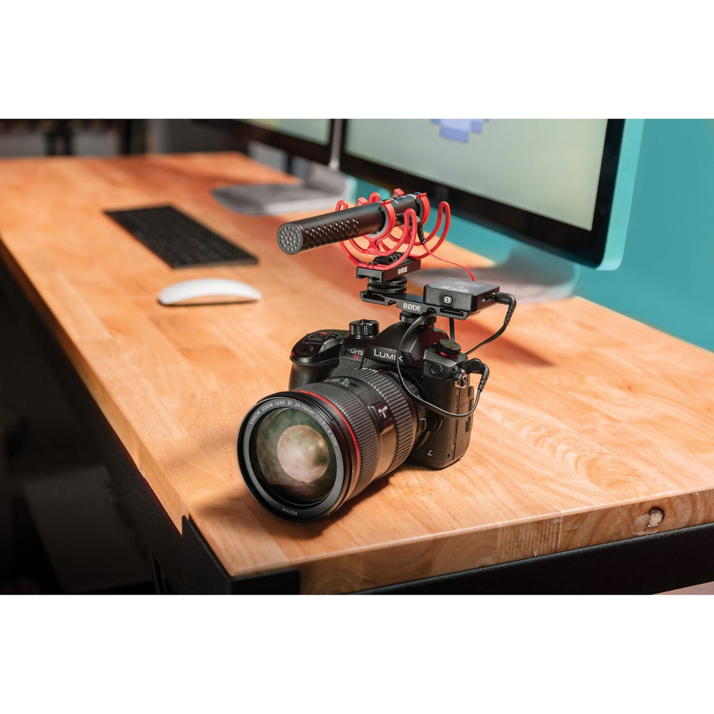 Rode SC11 audio adapter splitter with dual 3.5mm connectors for enhancing microphone and headphone connections.