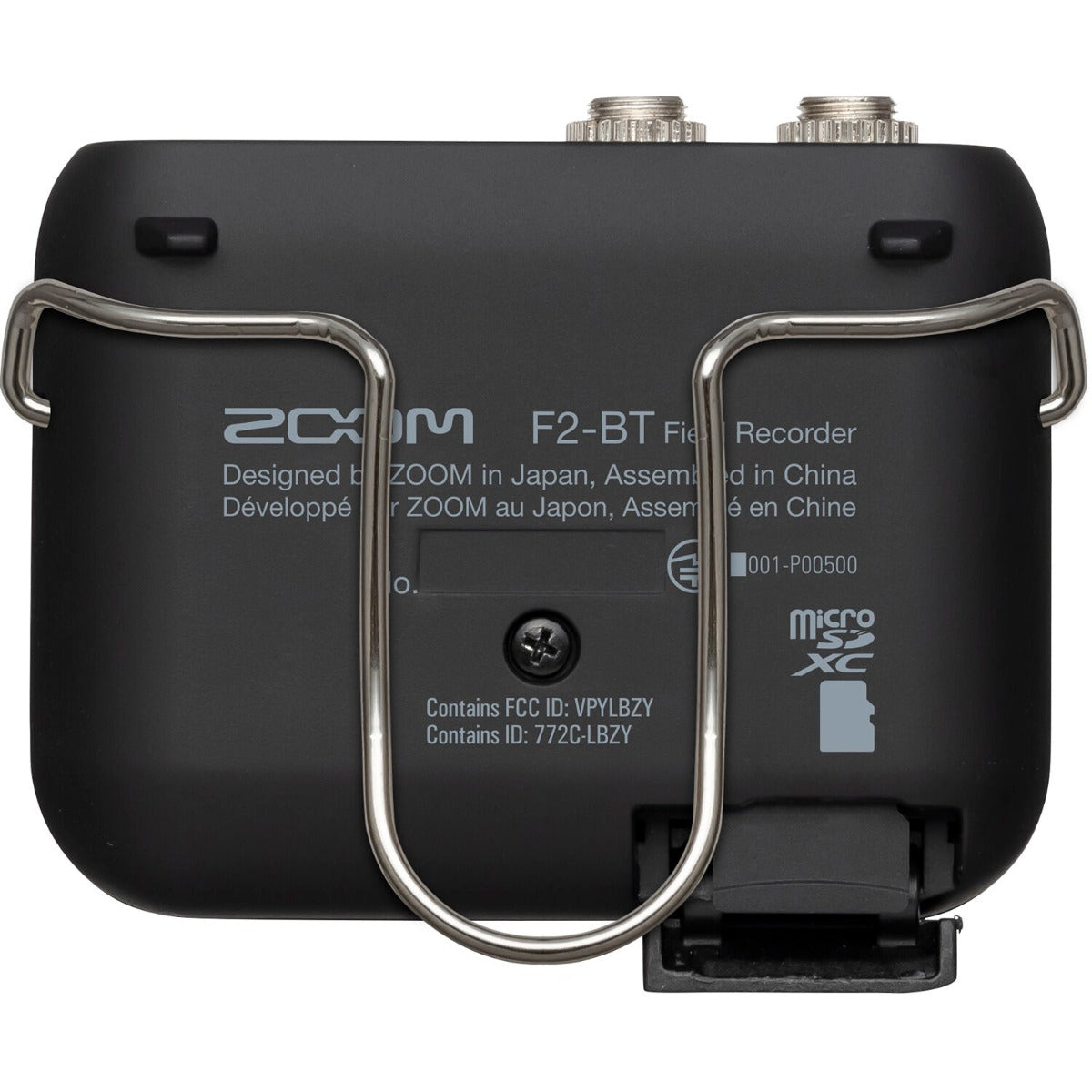 Zoom F2-BT digital recorder with compact design, featuring multiple input ports and built-in microphone for high-quality audio recording.