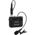 Zoom F2-BT digital recorder shown with its compact design and built-in microphones, ideal for high-quality portable audio recording.
