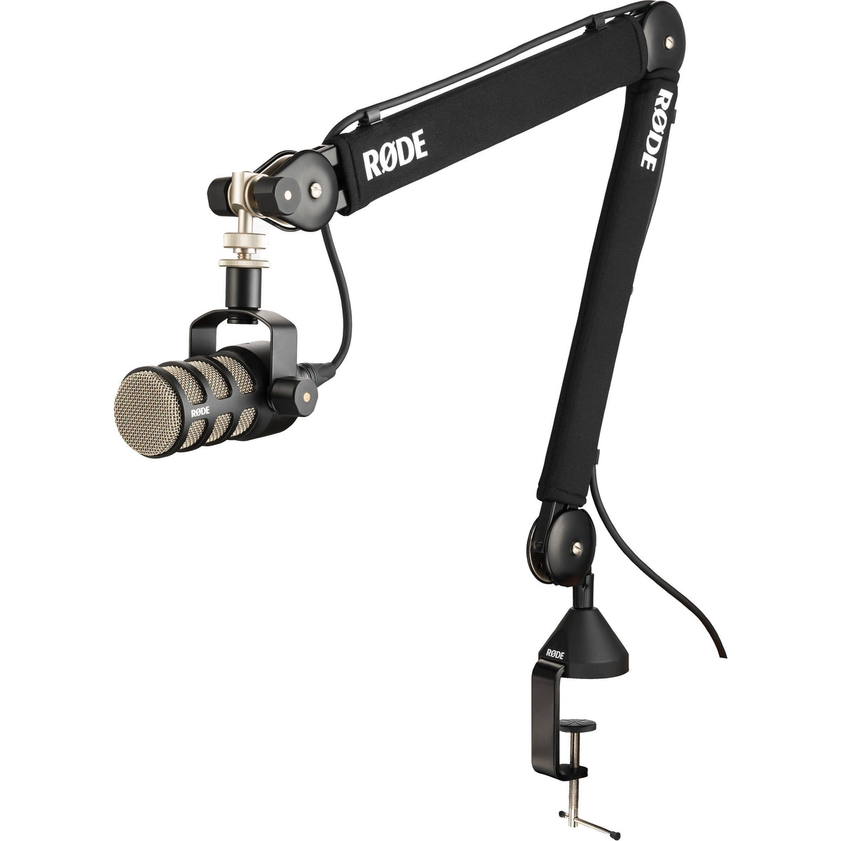 Rode PSA1+ broadcast microphone arm mounted on a desk, adjustable with flexible joints for professional audio setup.