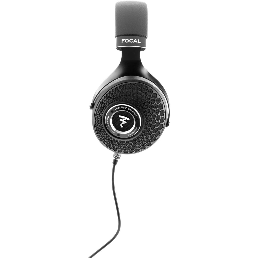 Focal Clear MG professional head-fi headphones with open-back design and silver ear cups, displayed on a stand.