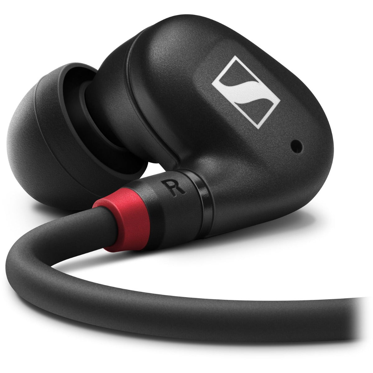 Sennheiser IE 100 Pro wired in-ear headphones with black ear tips and sleek design, close-up view of the earbud.