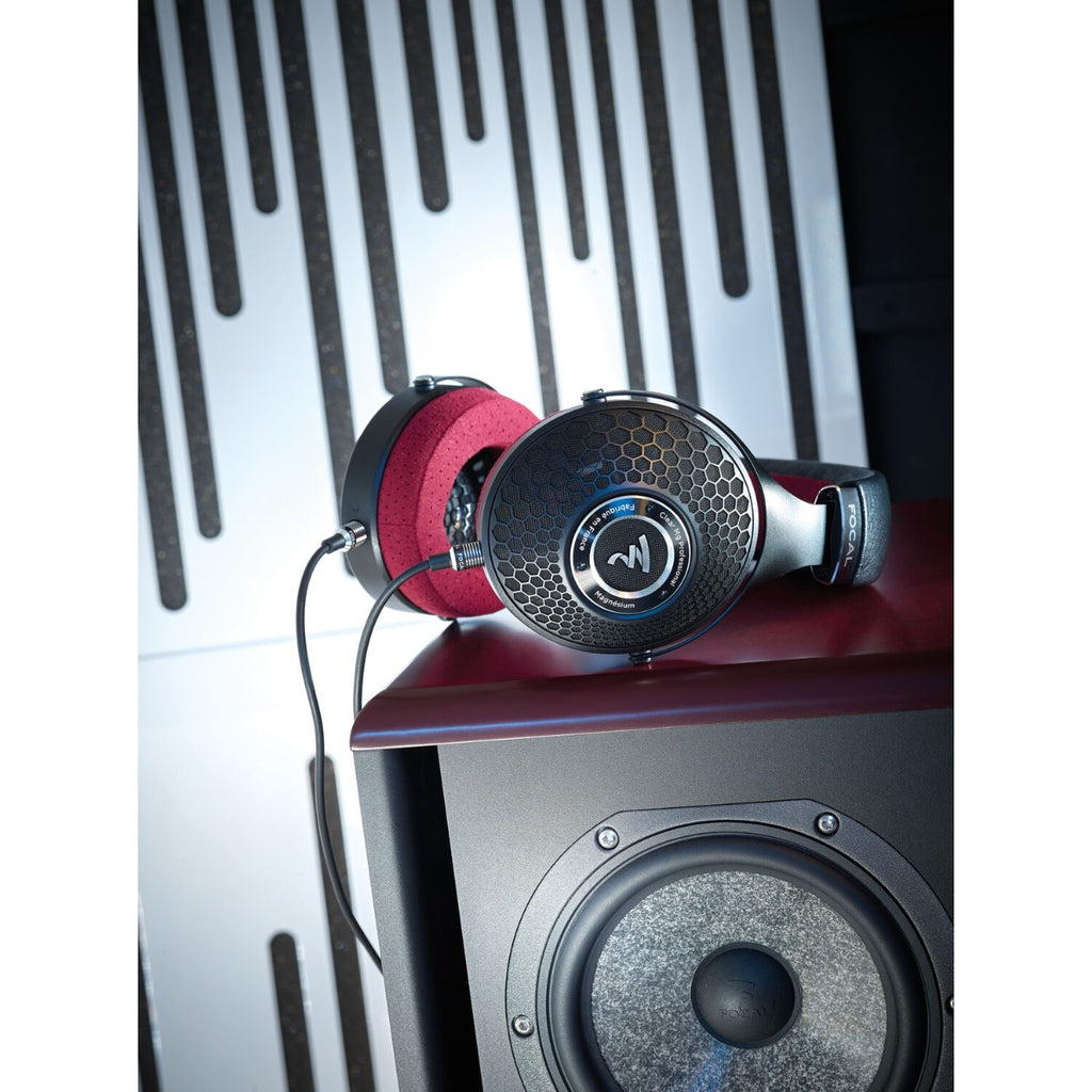 Focal Clear MG professional head-fi headphones with open-back design and sleek black ear cups for high-fidelity audio.
