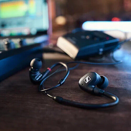 Sennheiser IE 100 Pro wired in-ear headphones with sleek black design and ergonomic earbuds for professional audio listening.