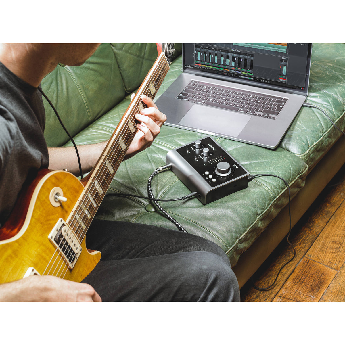 Audient iD14 MK2 audio interface with multiple input and output ports, compact design, and professional-grade controls.