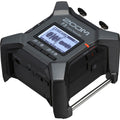 Zoom F3 digital recorder with multiple input ports and compact design, ideal for professional audio recording and field use.