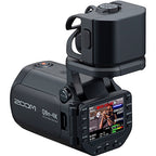Zoom Q8n-4K video camera with microphones and controls, showing front view with lens and screen in a well-lit setting.