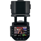 Zoom Q8n-4K video camera with adjustable lens and multiple ports, captured in a close-up shot showing controls and connections.