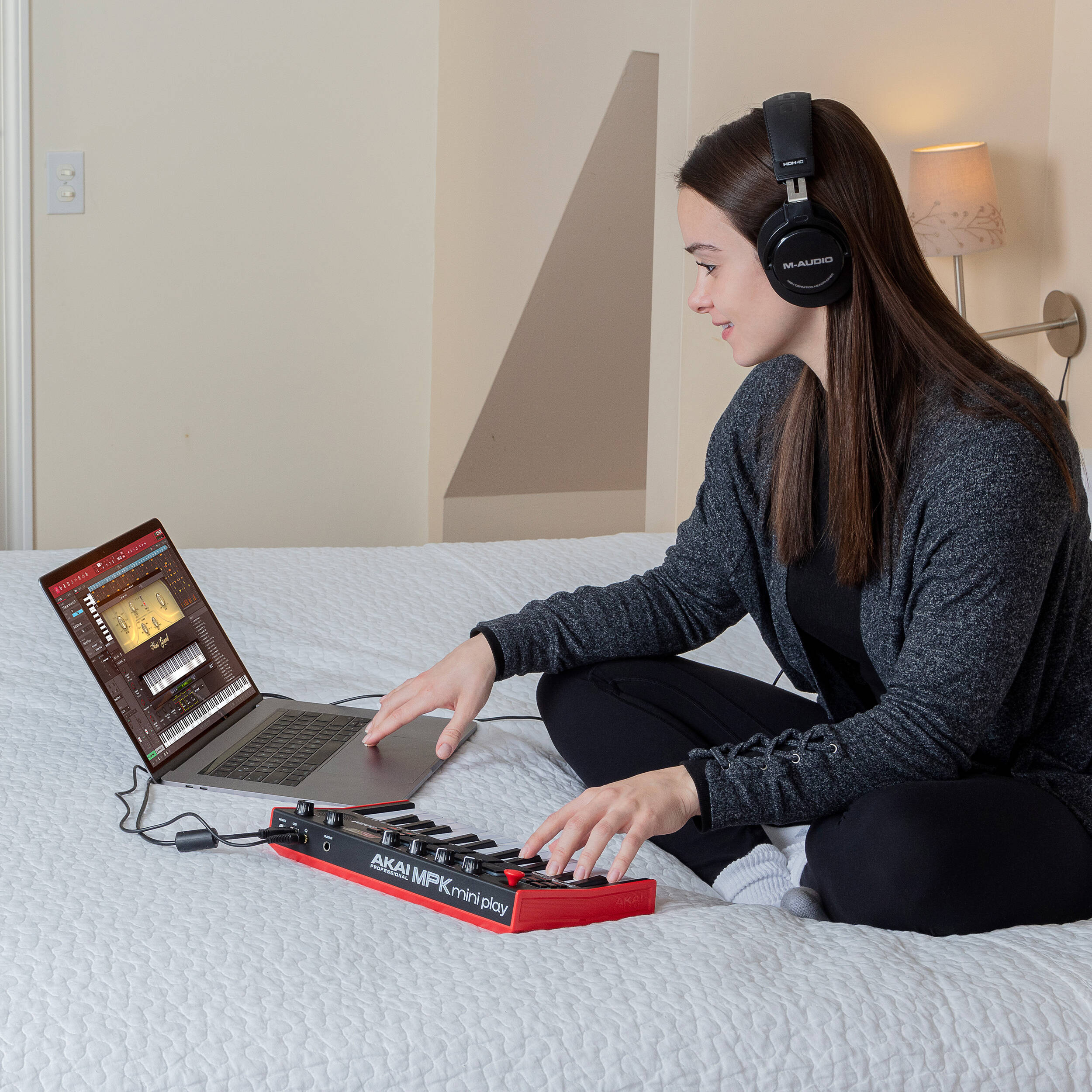 Akai Professional MPK Mini Play MK3 MIDI keyboard with compact design, colorful pads, and built-in sound module.