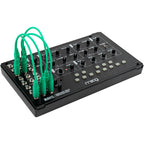 Moog Mavis synthesizer with vintage-style control panel and patch cables, showcasing its electronic keyboard and knobs.