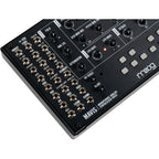 Moog Mavis synthesizer with control knobs and keyboard, showcasing its compact design and vintage-inspired electronic music instrument.